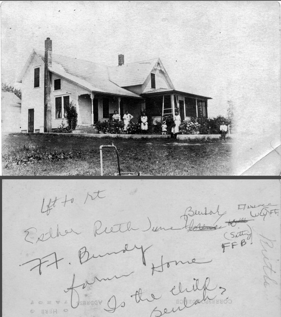 Francis Bundy family in front of their home, early 1920's. Click twice to see details. Caption on back indicates, left to right: Esther, Ruth, June, Beulah, William, Lucy, Florence, Francis. (Original: Janet Lucius)