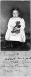 June Bundy, 3 or 4 years old, holding the teddy bear given to her by her grandfather William Bundy.  Around 1909.  (Original: Joan Collinge)