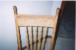 Ornate woodwork on the backboard of Lucy Bundy's rocking chair. (Original: Mary MacLeod)