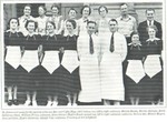 Marion Bundy, bottom row, second from left, with the staff of the St. James Hotel, Red Wing, 1937.  Comments from Mary Hundeby: "Aunt Marian worked at the hotel for about 15 years, leaving in 1946 when she married Uncle Royal.  An interesting sidelight of this picture - William Pirius, also shown in the picture, was married to Creola (you may remember Creola's Dress Shop, next to the Ben Franklin Store, which burned at the same time the Ben Franklin did) - at any rate, they built the house at 819 Bush St., in 1938, and 
mother bought it 1944 for $3500."  (From "If Walls Could Talk - A Story of the Old St. James", published 1984 by the Red Wing Hotel Association)