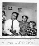 December 1954. William, Lucy, and Joan. Caption on back evidently written by Lucy. Additional writing on back (not written by Lucy) says "Dec 1954". (Original: Janet Lucius)