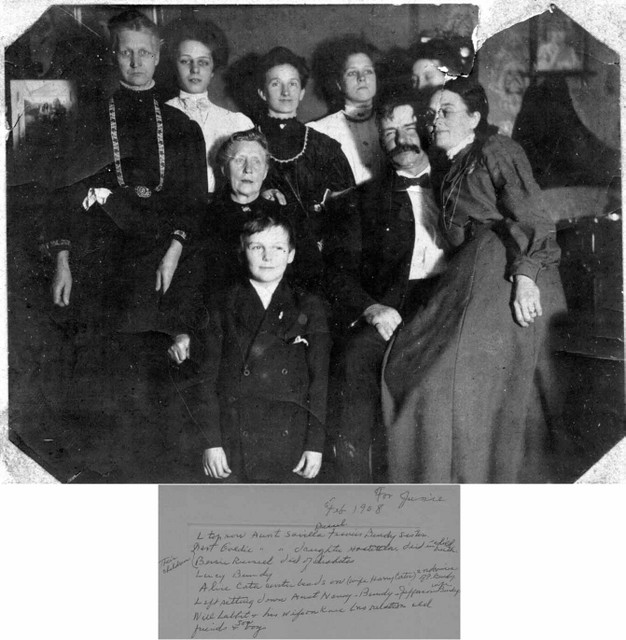 Identification from the notes on the back.
Back row, l to r: Savilla (Bundy) Russell, Goldie (Russell) Hostettler, Alice Cater (2nd cousin of Francis Bundy), Bessie Russell, Lucy (Whaley) Bundy.  Sitting down on the left is Nancy (Hevener) Bundy (Thomas Jefferson Bundy's wife).  The couple in front to the right are family friends Will Labbit and his wife.  The boy in front is the son of Will Labbitt.  February, 1908. (Original: Mary Hundeby)