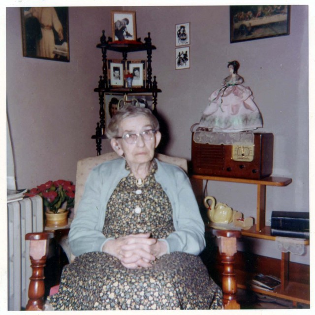 Josie (Whaley) Jerry, sitting in her sister Lucy (Whaley) Bundy's rooms on the upper floor of 819 Bush Street, probably 17 September 1955, the day of Gilbert Northey and Sharon Stuhr's wedding. (Original: Debbie Mcgalin, Florence Stuhr's photo album #1)