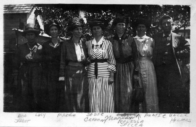Cousins related through the Soules line.  Left to right: Ada (Sibley) Jarret [daughter of Joseph Sibley and Emily Soules], Lucy Whaley and Martha Whaley [daughters of Cy Whaley and Eliza Soules], Sadie Graham, Melissa (Sibley) Spicer [daughter of Joseph Sibley and Emily Soules], "Auntie" is probably Josephine (Whaley) Jerry [another picture in the same handwriting uses "Auntie" to refer to a photo that is definitely Josie], Holmes Whaley. (Original: Mary Hundeby)