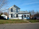 Francis Bundy did well at farming, and owned a house in Lake City, as well as one in Red Wing.  This is the first house he owned in Lake City, directly across the street from 612 Garden Street.  This is the house where his first wife, Bertha, died.  Bertha had a breathing problem, and Francis and Bertha actually moved to Colorado from this house for a year, in a wagon that Francis built for the purpose (Francis was quite industrious.)  The clean air in Colorado did absolutely nothing for Bertha, so they came back here.  They brought Ada Boughton along, and there is a story that Ada did not like it in Colorado, which was another reason they had to come back.  44.44355, -92.26358 (Photograph by Bob Hart, November 2004)